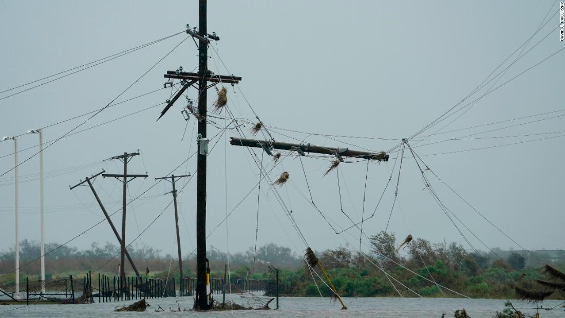 Laura heads east after killing 15 people and leaving half a million without power – under a heat advisory
